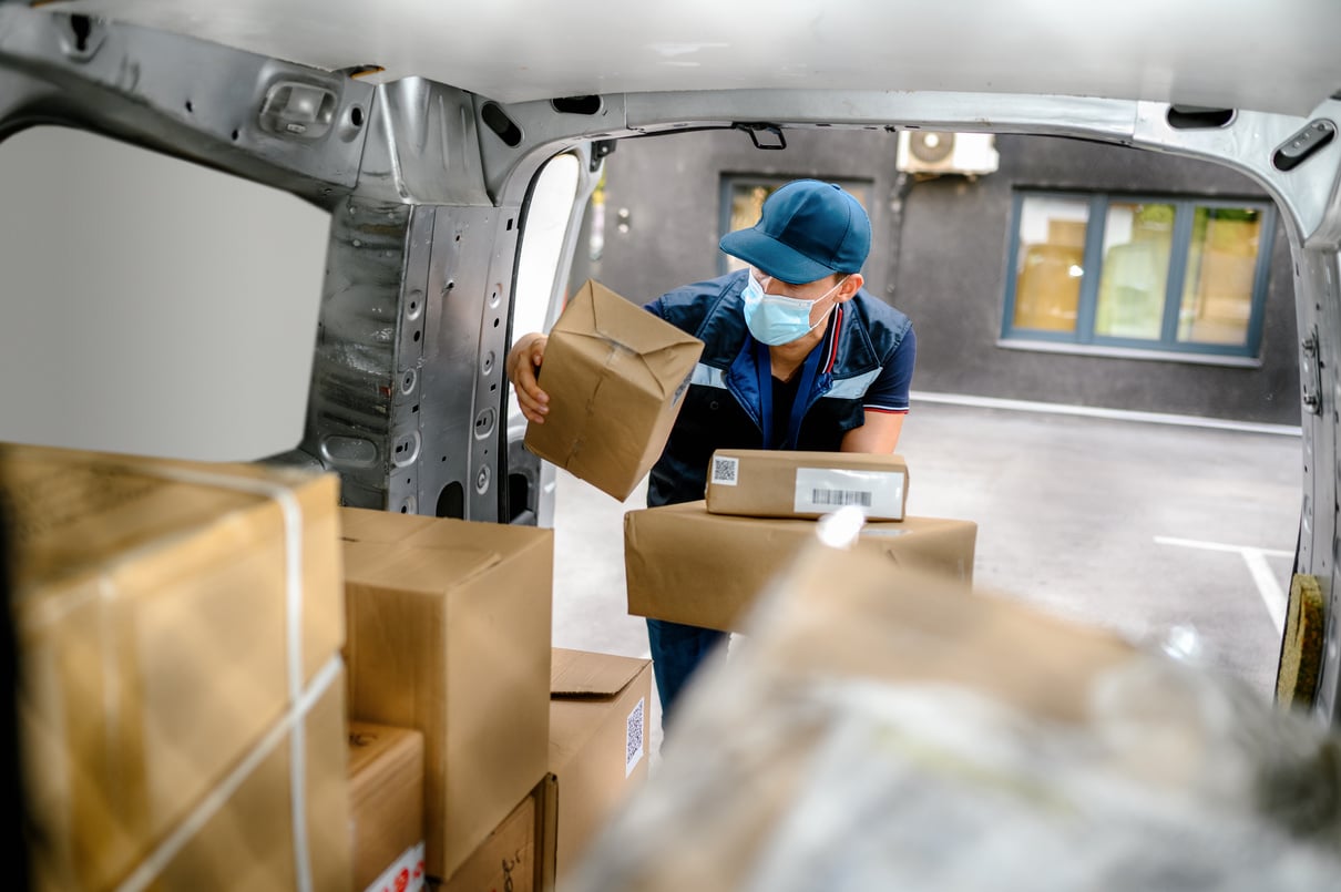 Courier delivering parcel
